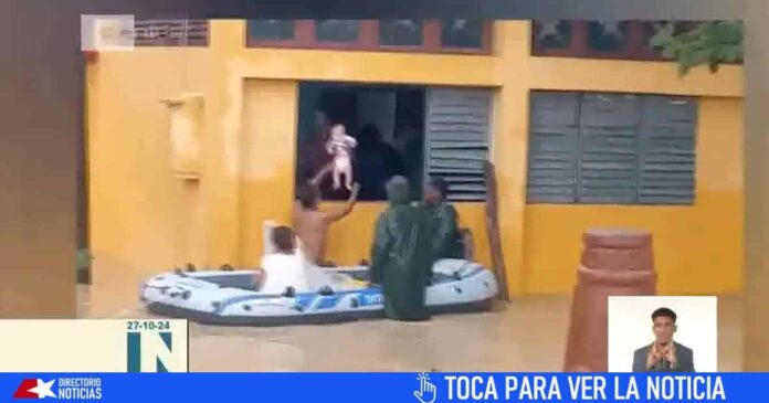 Noticiero cubano informa sobre el rescate de un bebé en Guantánamo durante el huracán Óscar